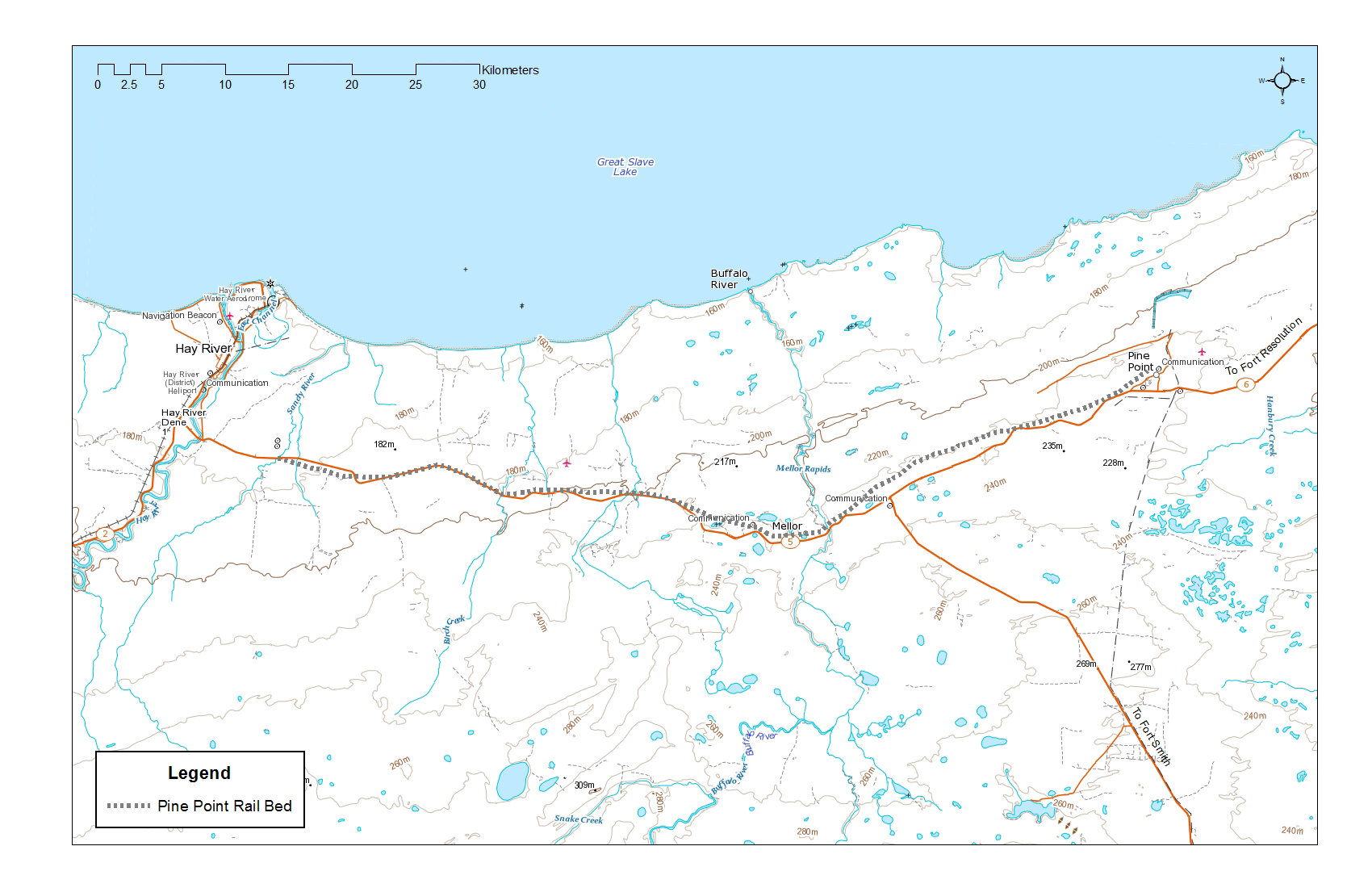 A map shows the path of the railbed at the former Pine Point Mine in the Northwest Territories. The railbed is about 80 km long and runs along the south shore of Great Slave Lake. Its westernmost point begins east of Hay River and extends to the decommissioned Pine Point Mine, west of Fort Resolution.